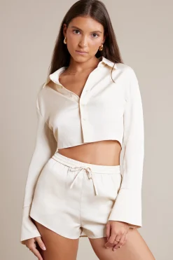 Oh Polly Bride To Be^Bias Cut Satin Long Sleeve Cropped Shirt in Ivory