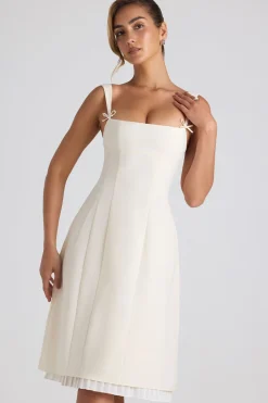 Oh Polly Georgette And Chiffon^Bow-Detail Pleated A-Line Midi Dress in Ivory
