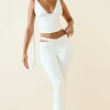 Oh Polly Bottoms^Petite Cut-Out Mid-Rise Flared Trousers in Vanilla