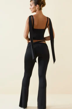 Oh Polly Bottoms^Petite Cut-Out Mid-Rise Flared Trousers in Black