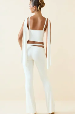 Oh Polly Bottoms^Petite Cut-Out Mid-Rise Flared Trousers in Vanilla