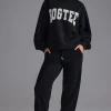 Oh Polly Tracksuits | Petite^Petite Relaxed Mid-Rise Joggers in Black