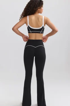 Oh Polly Petite^Petite Soft Active Contrast-Trim Flared Trousers in Black