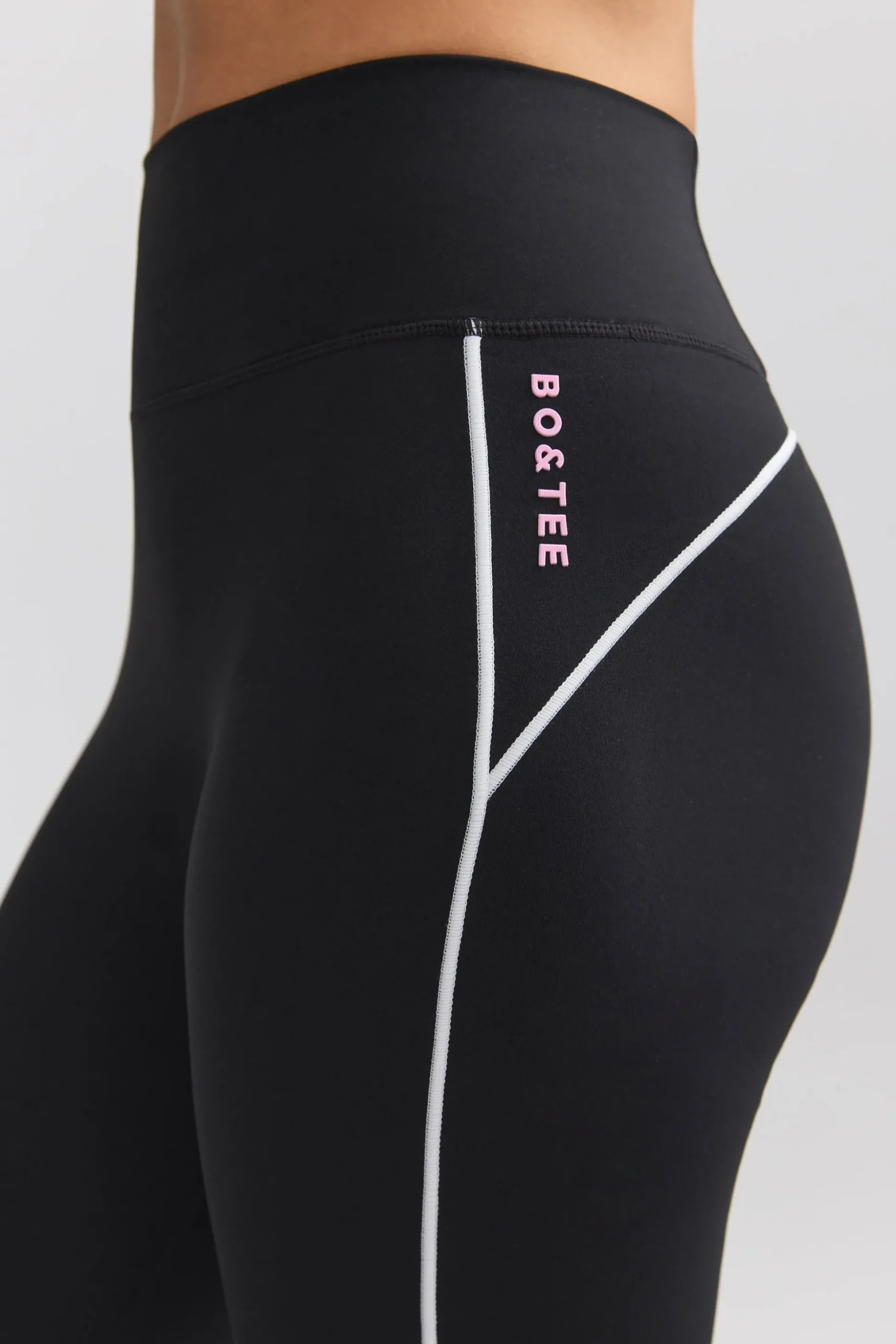 Oh Polly Petite^Petite Soft Active Contrast-Trim Flared Trousers in Black