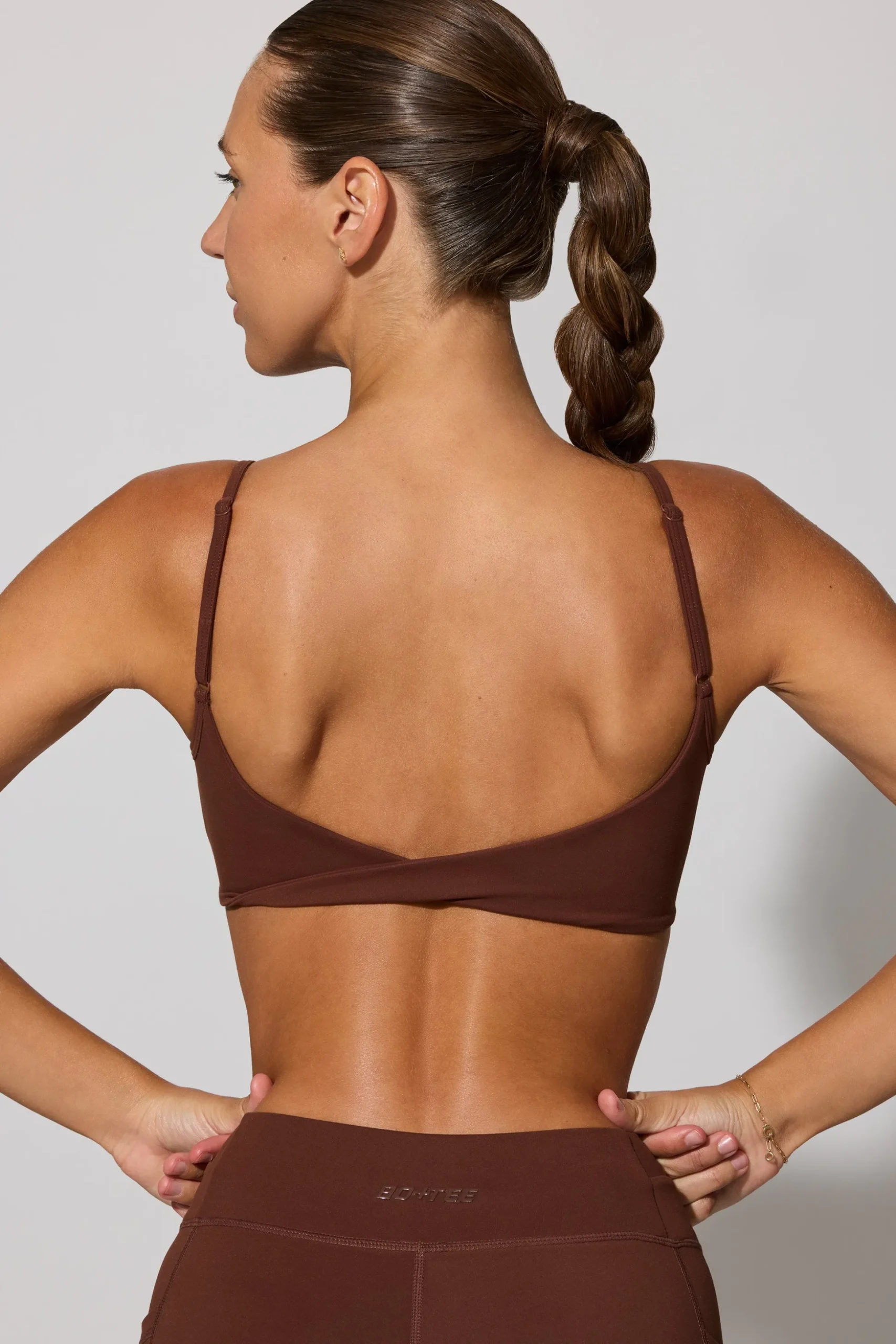 Oh Polly Matching Sets | Sports Bras^Twist Back Scoop Neck Sports Bra in Chocolate